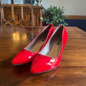 Cherry red patent leather pump. Size 8
